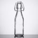 8.5 oz Clear Glass Bottle Fliptop 12 pieces